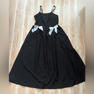Elegant Black Dress with White Bows